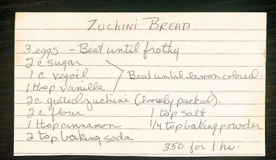 Handwritten zucchini bread recipe on an index card.