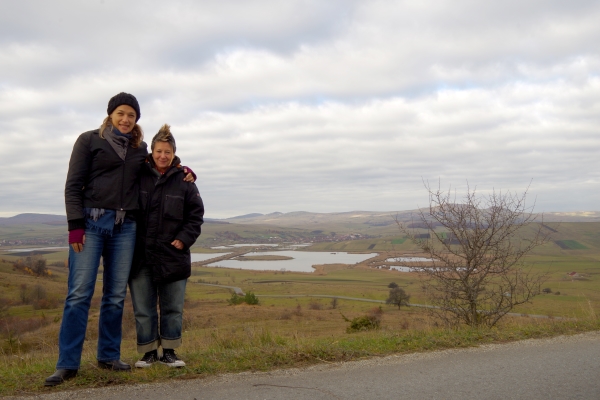 Spike and her girlfriend, Krysia, with her great-grandmother’s village, Szentpál, in the background.