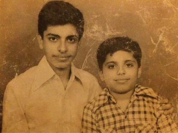 Black and white sepia photo of Neeraj (right) and his elder brother (left) as young children.