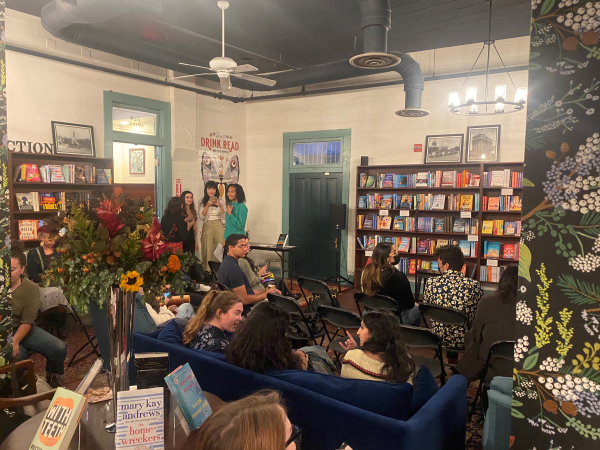 A crowd inside Vintage Bookstore and Wine Bar.