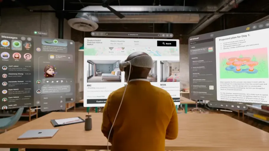 Male with back turned to camera wearing a VR headset.